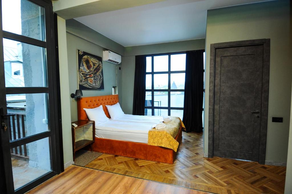 Double Room with Balcony (2 Adults + 1 Child)